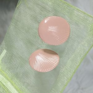 Vintage mid-century modern peach shell style post earrings